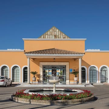 a building with a fountain in front of it