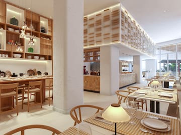 a restaurant with tables and chairs