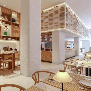 a restaurant with tables and chairs