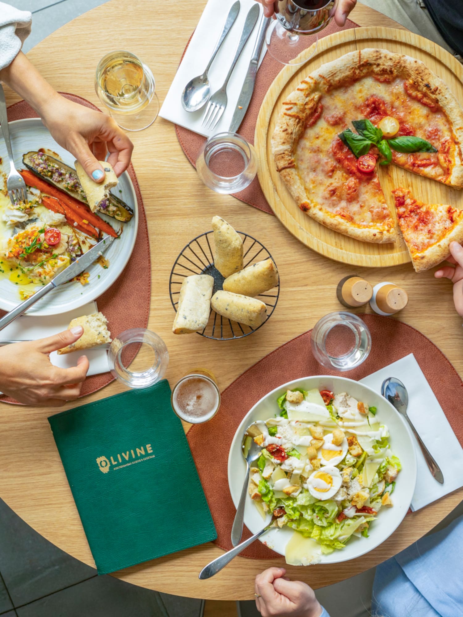 a group of people eating at a table