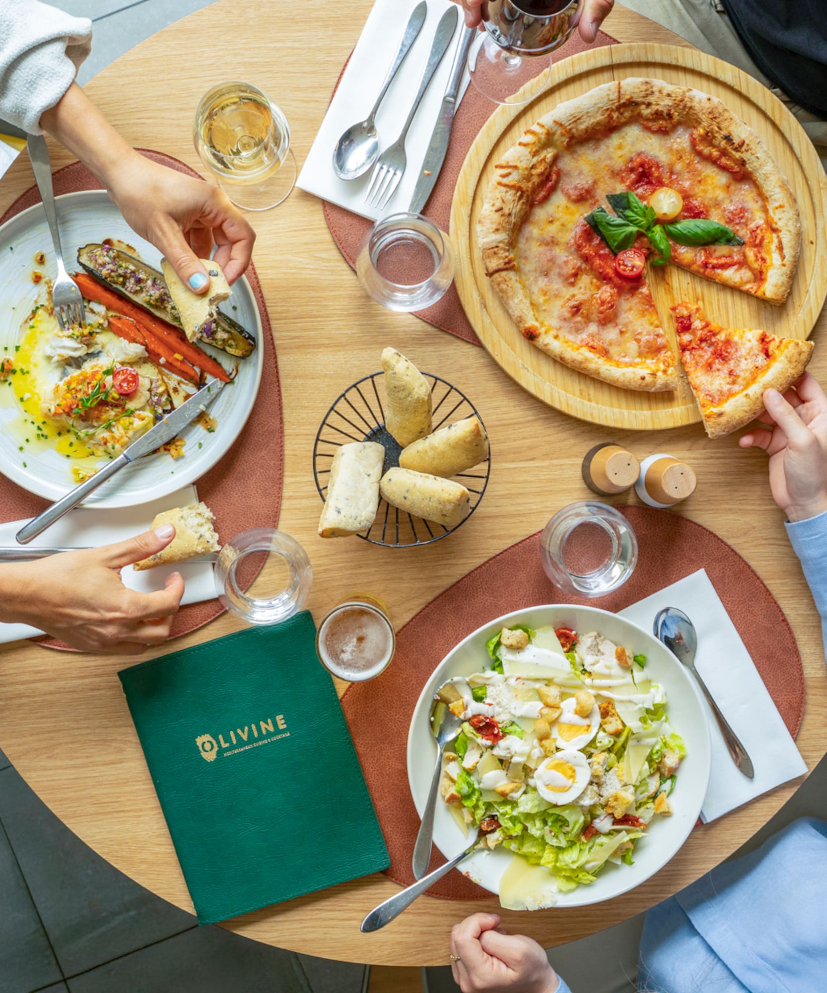 a group of people eating at a table