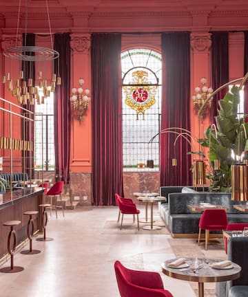 a room with tables and chairs