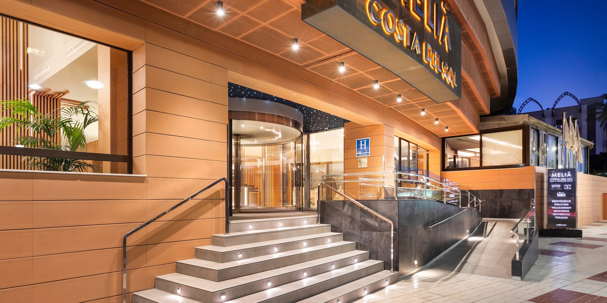 a building with stairs leading to the entrance