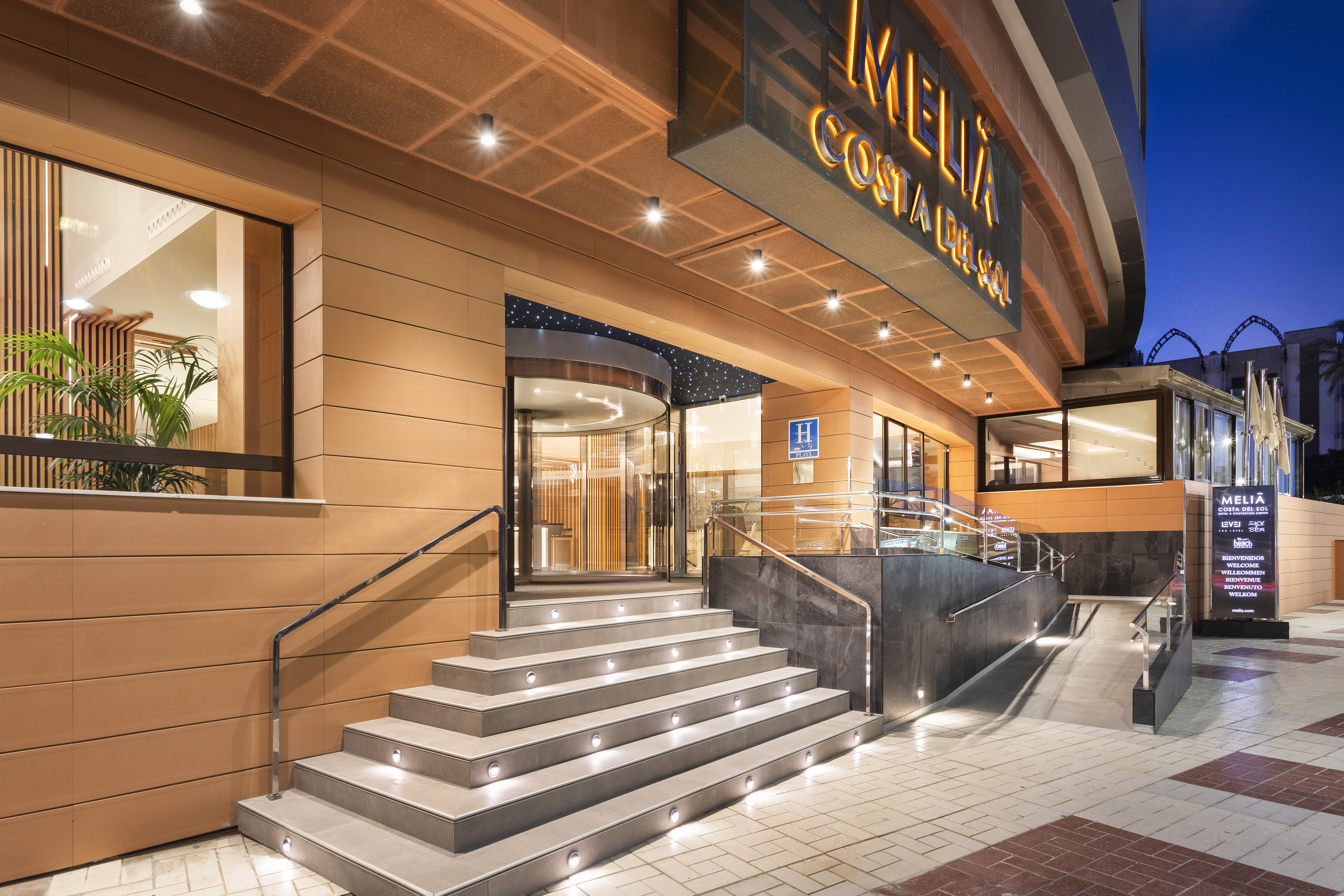 a building with stairs leading to the entrance