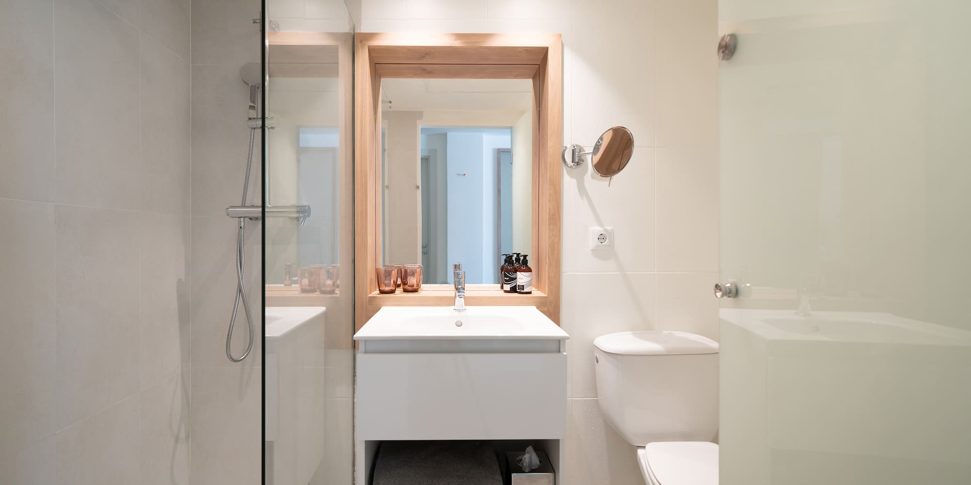 a bathroom with a shower and sink