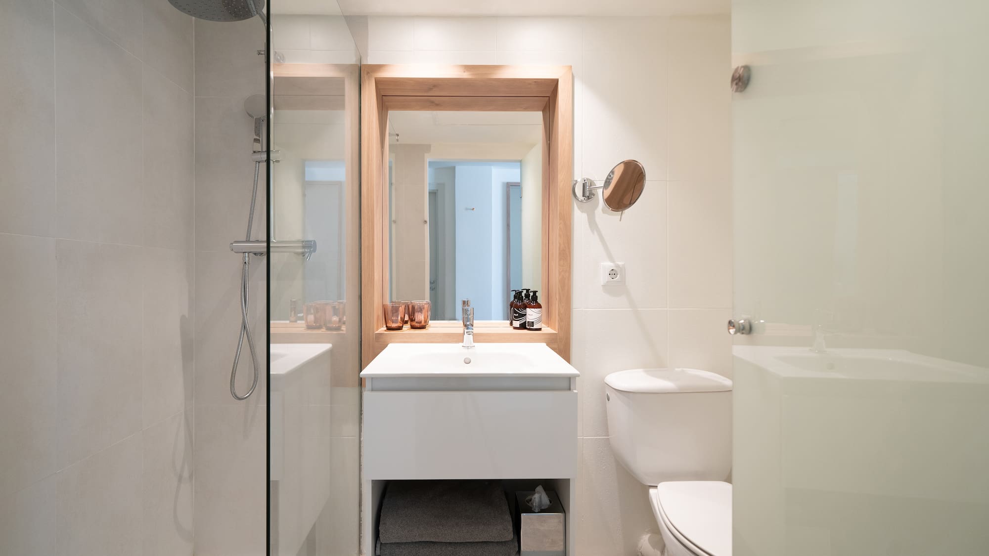 a bathroom with a shower and sink