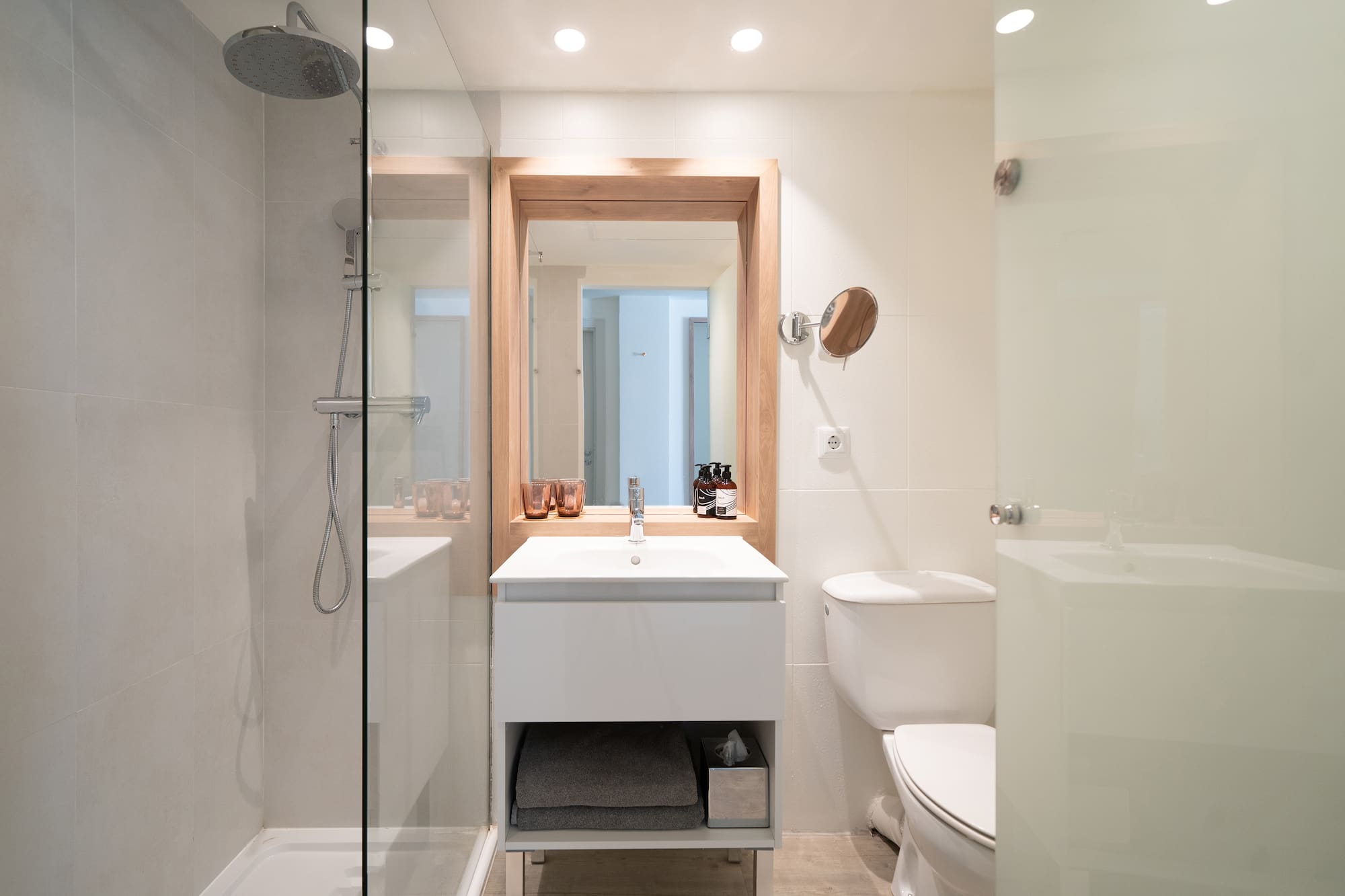 a bathroom with a shower and sink