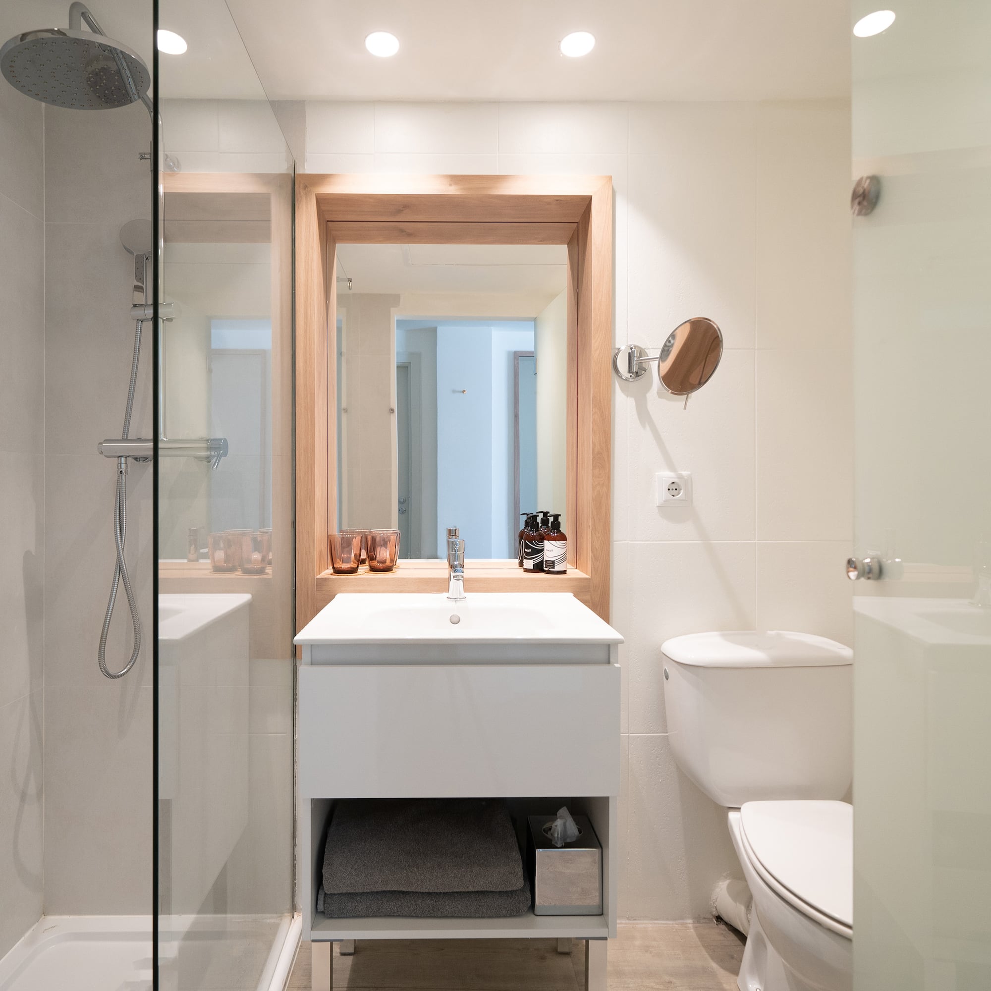 a bathroom with a shower and sink