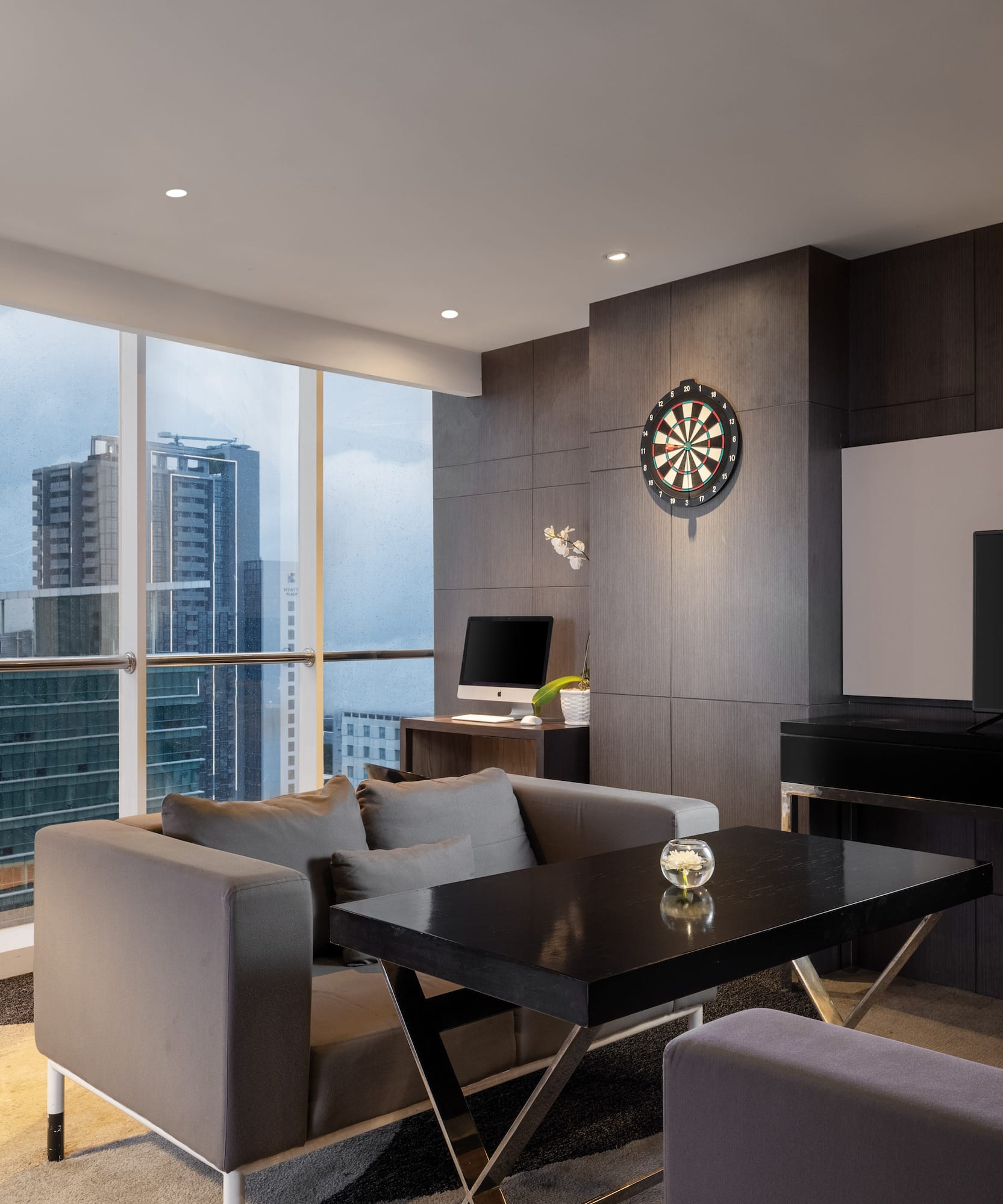 a room with a television and a table