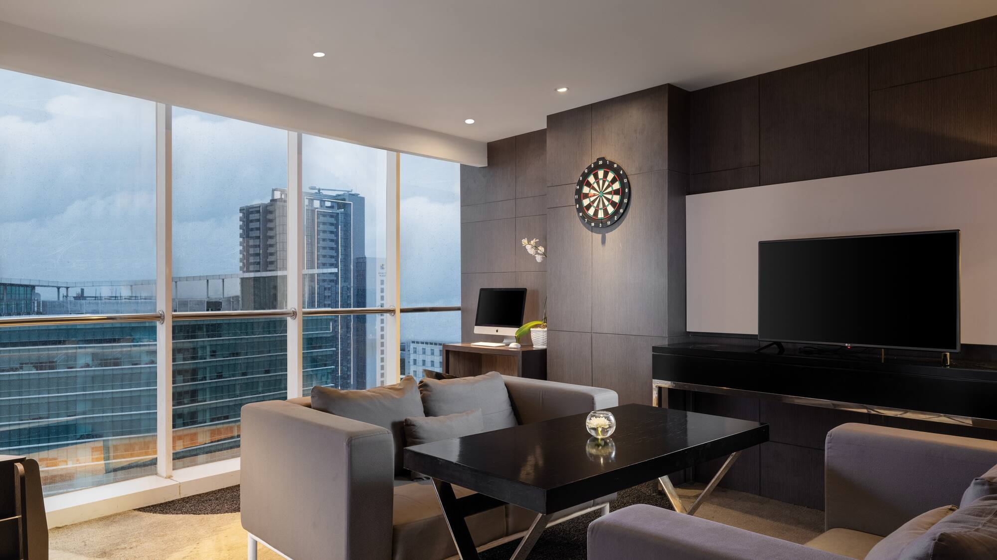 a room with a television and a table