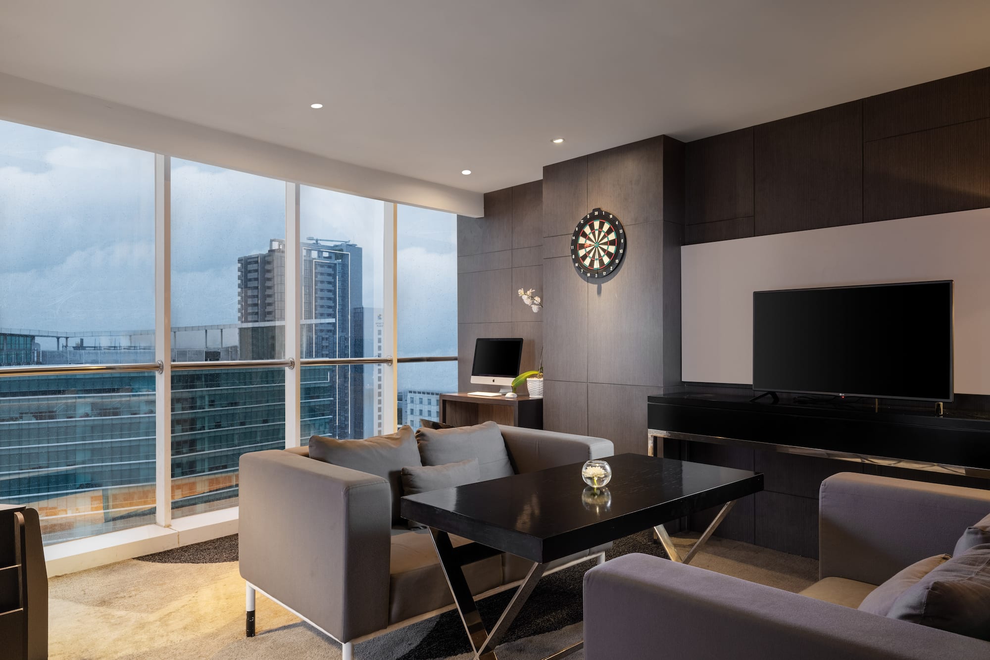 a room with a television and a table