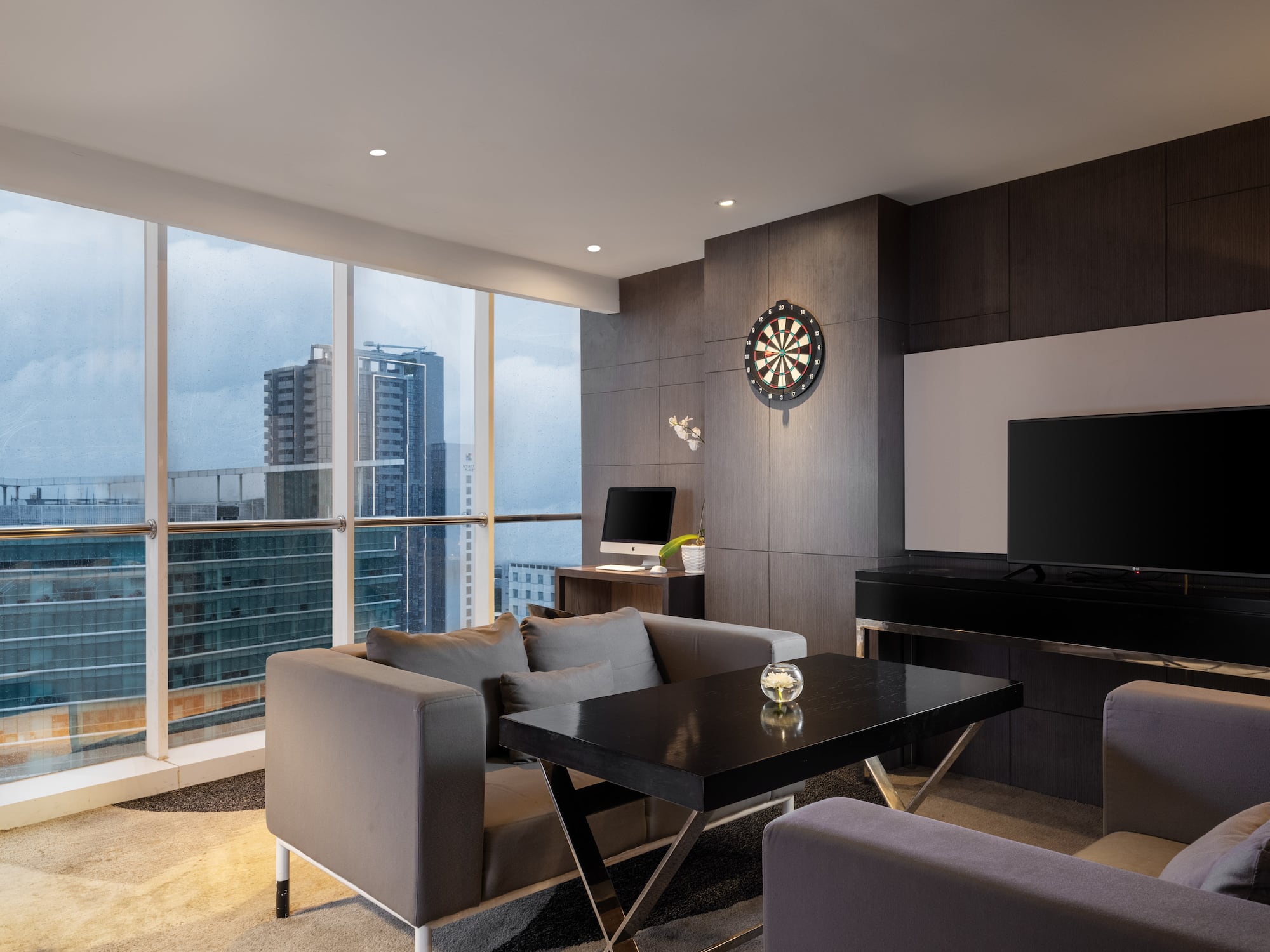 a room with a television and a table