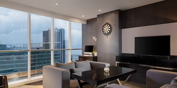 a room with a television and a table