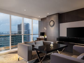 a room with a television and a table