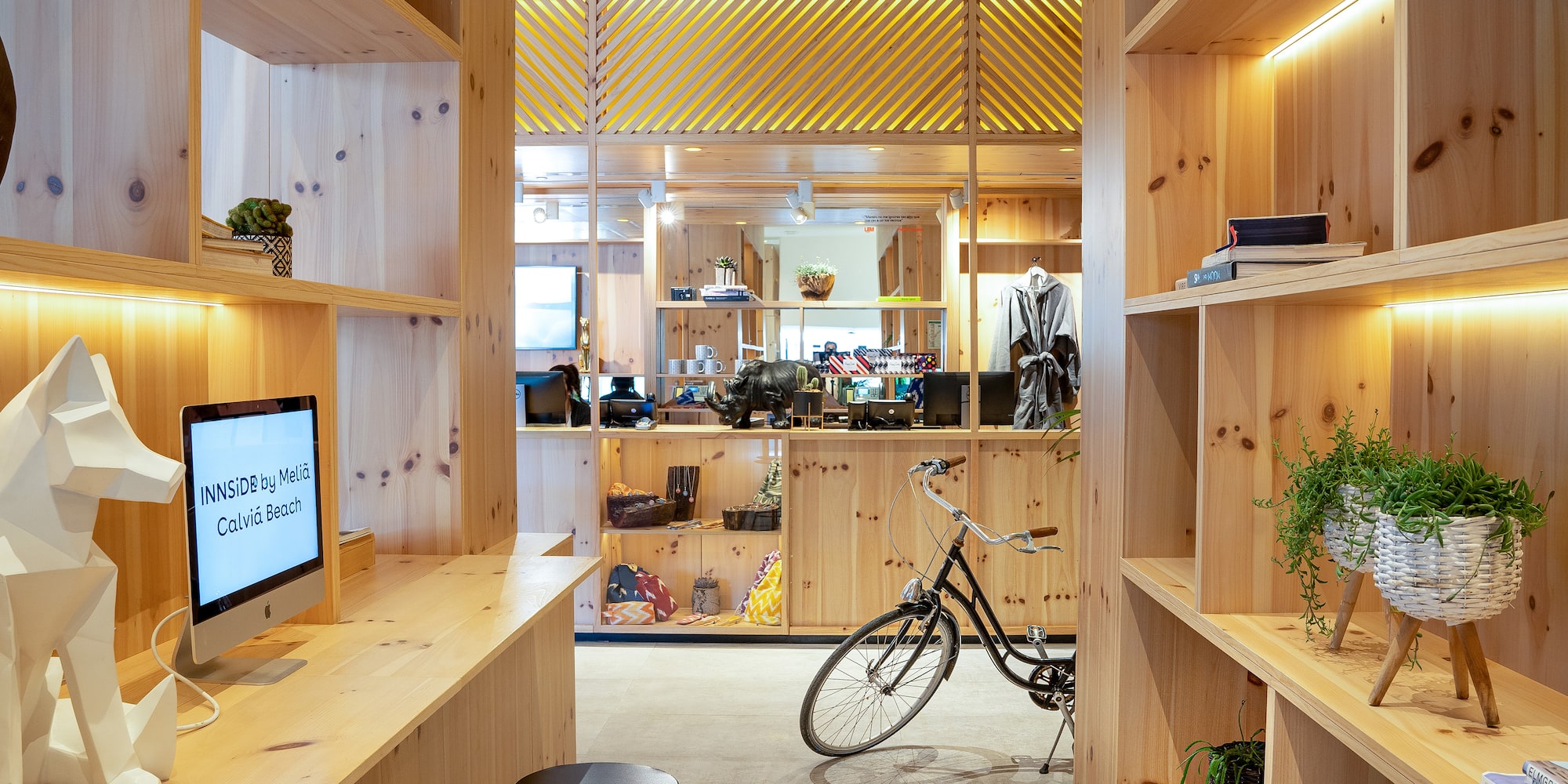 a room with a bicycle and shelves
