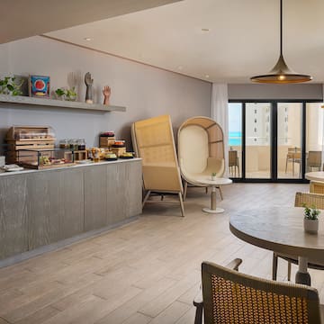 a room with a table and chairs