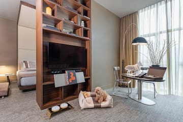 a room with a tv and a table