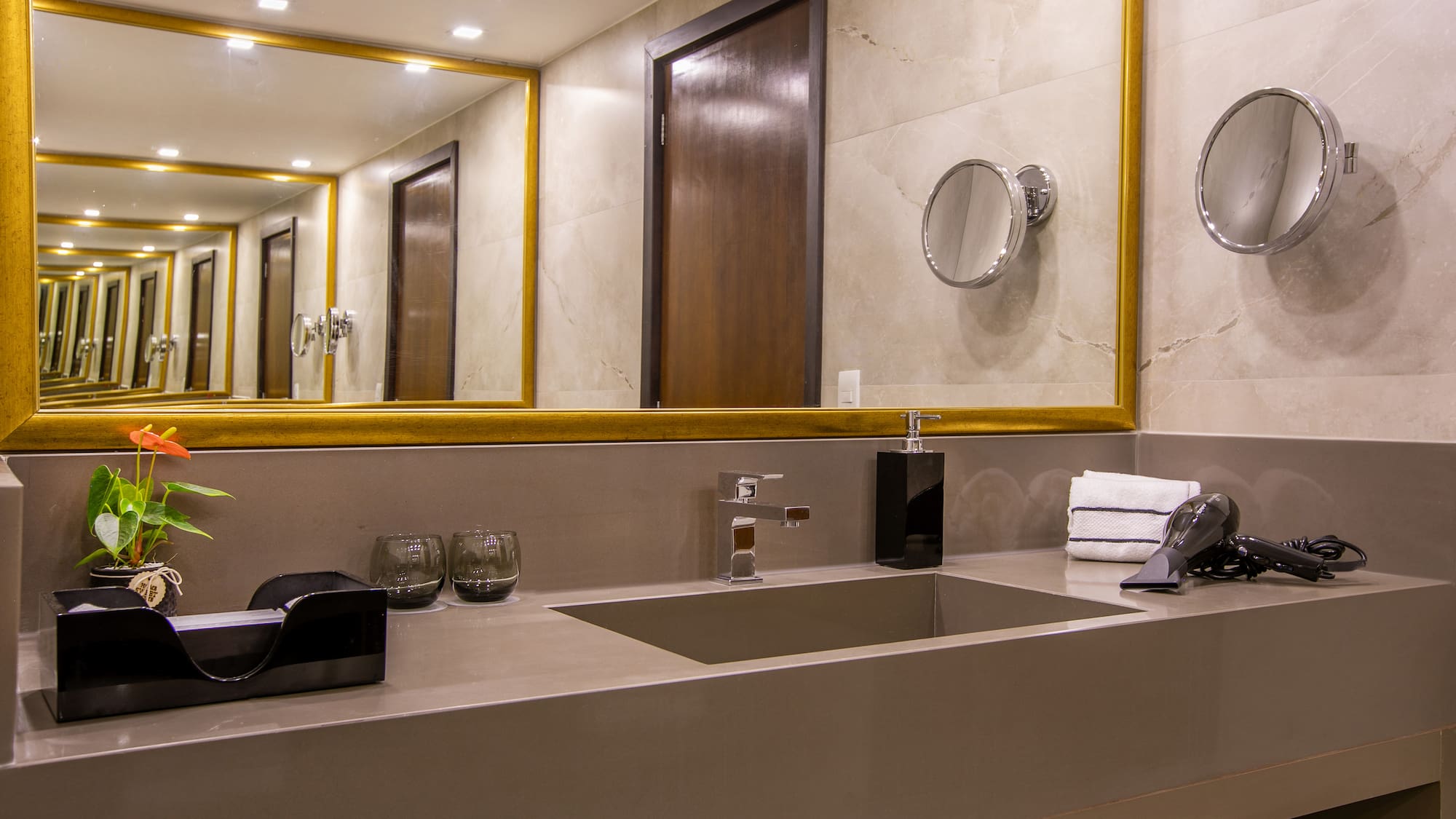 a bathroom with a mirror and sink