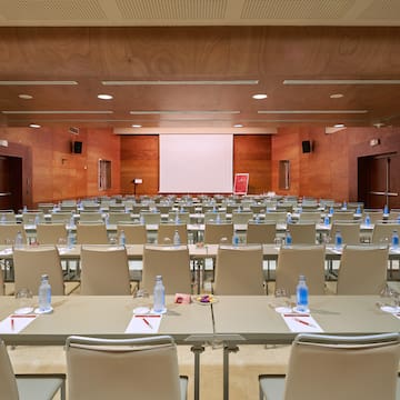 a room with tables and chairs