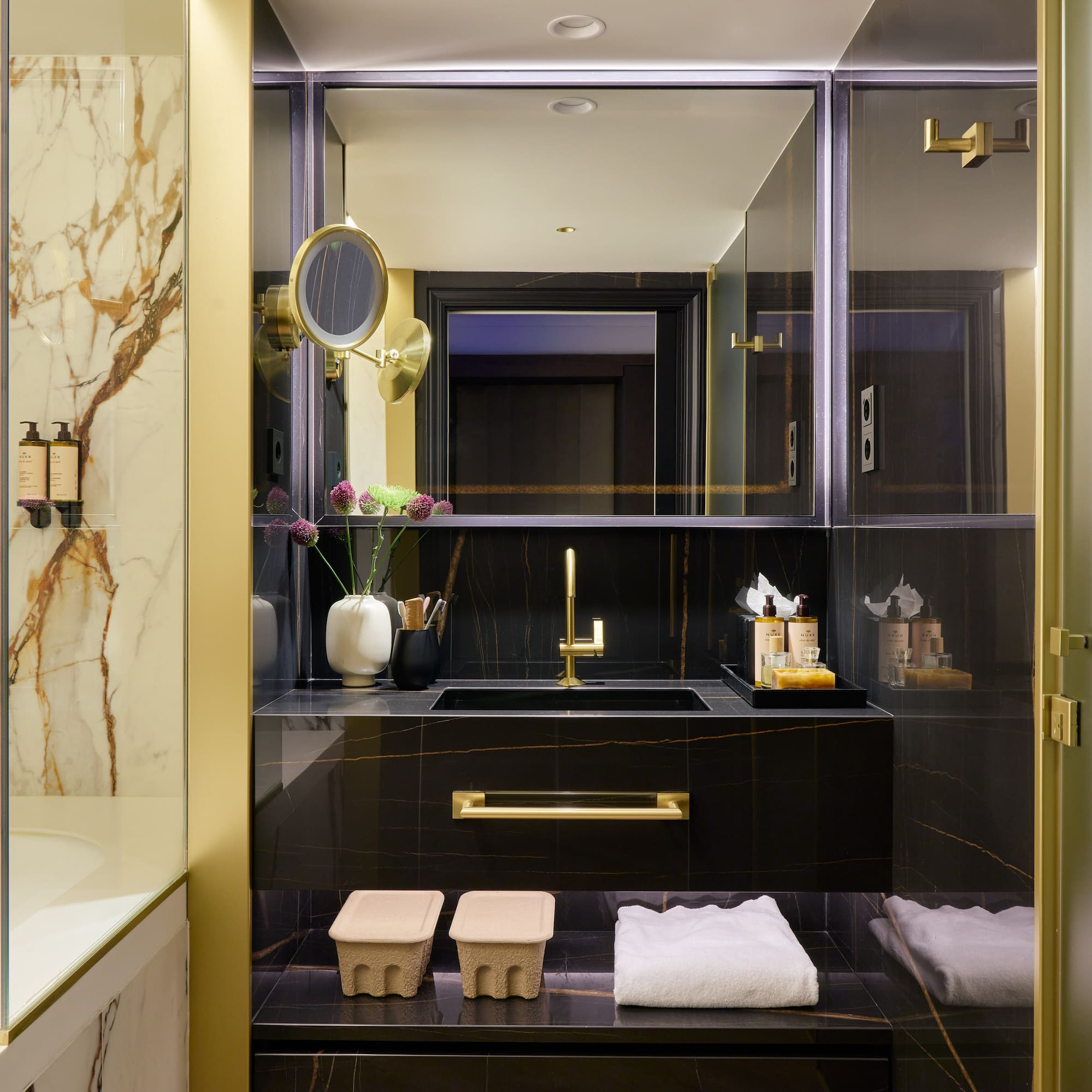 a bathroom with a mirror and sink