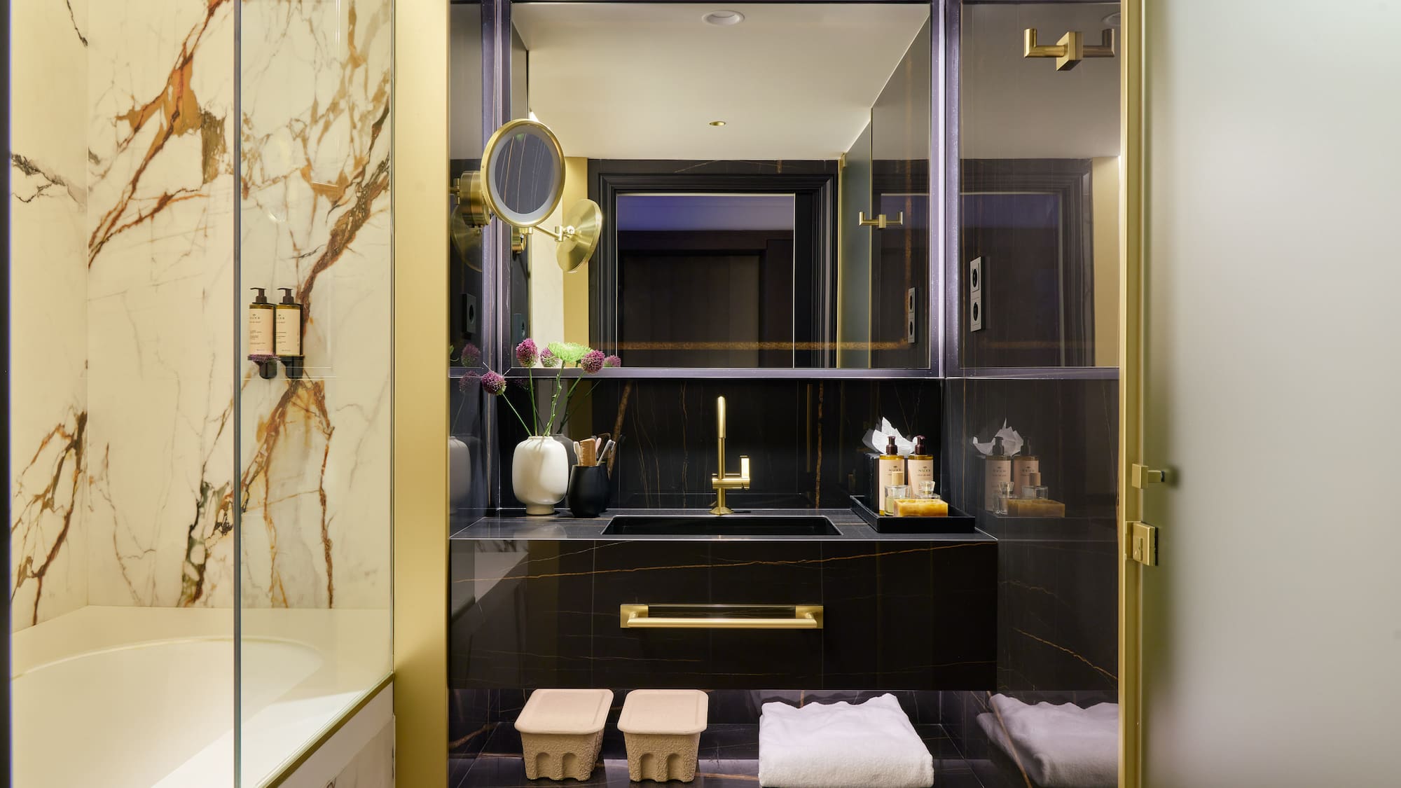 a bathroom with a mirror and sink