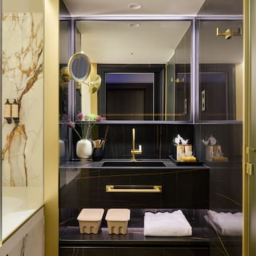 a bathroom with a mirror and sink