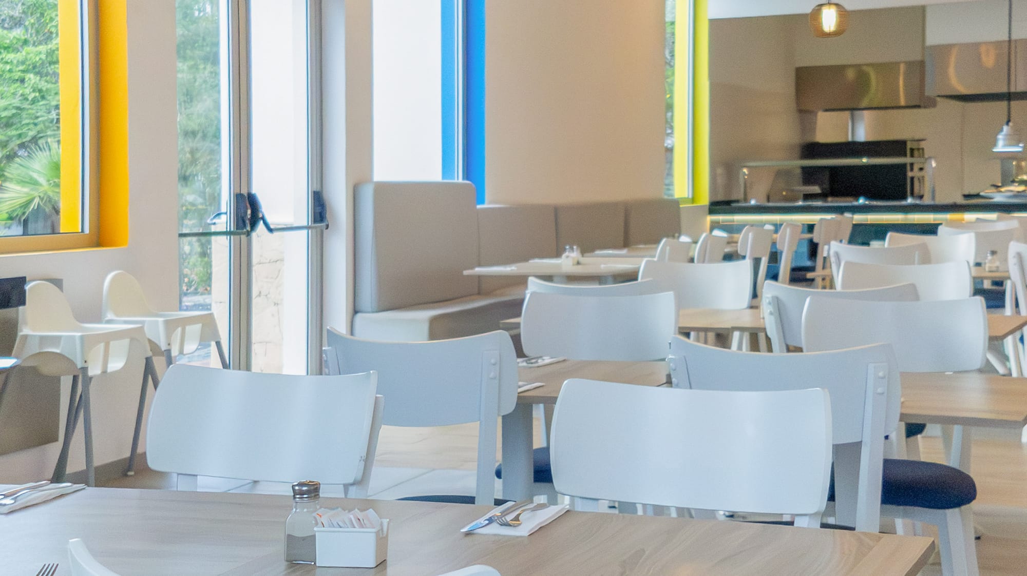 a room with tables and chairs