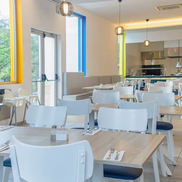 a room with tables and chairs