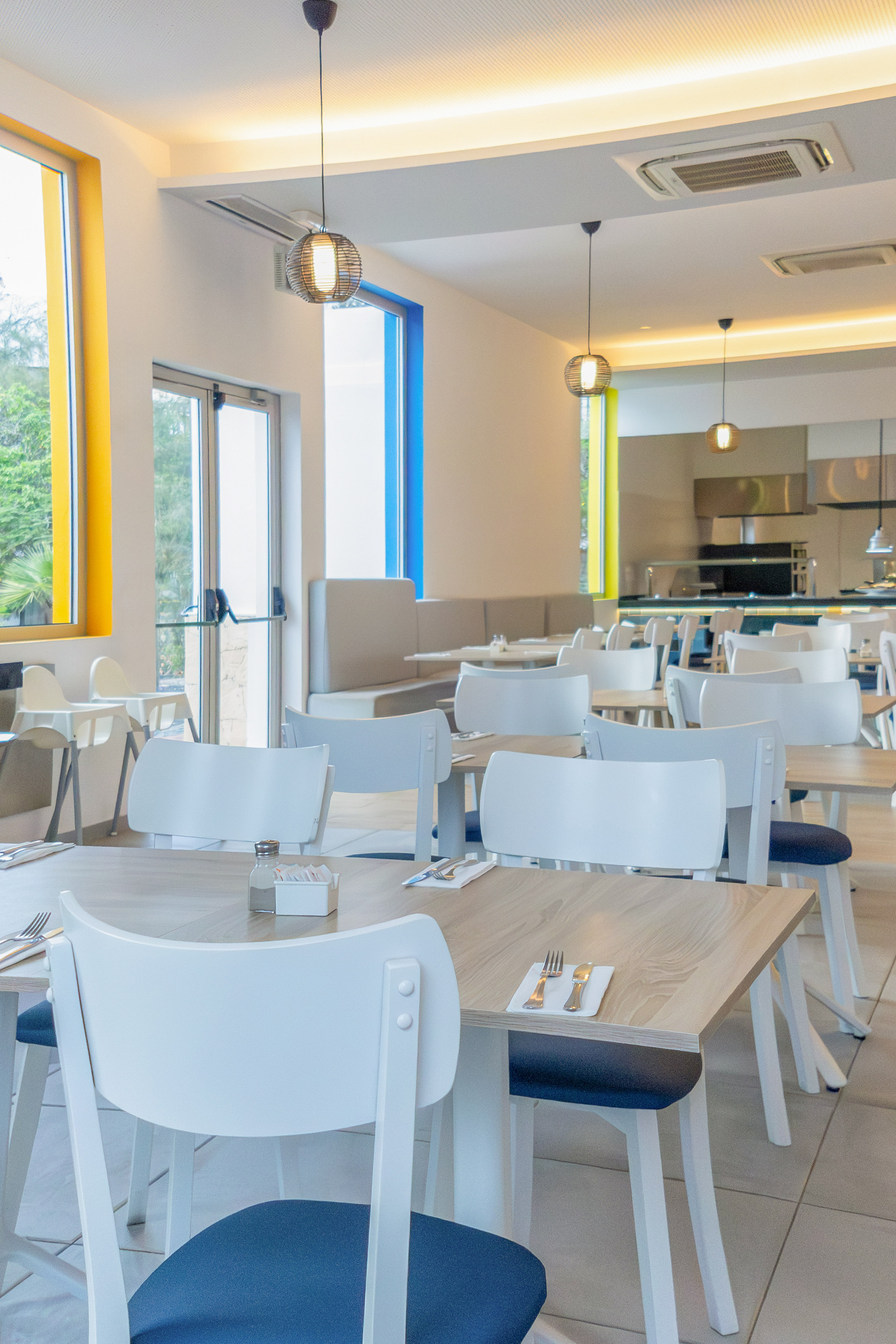 a room with tables and chairs