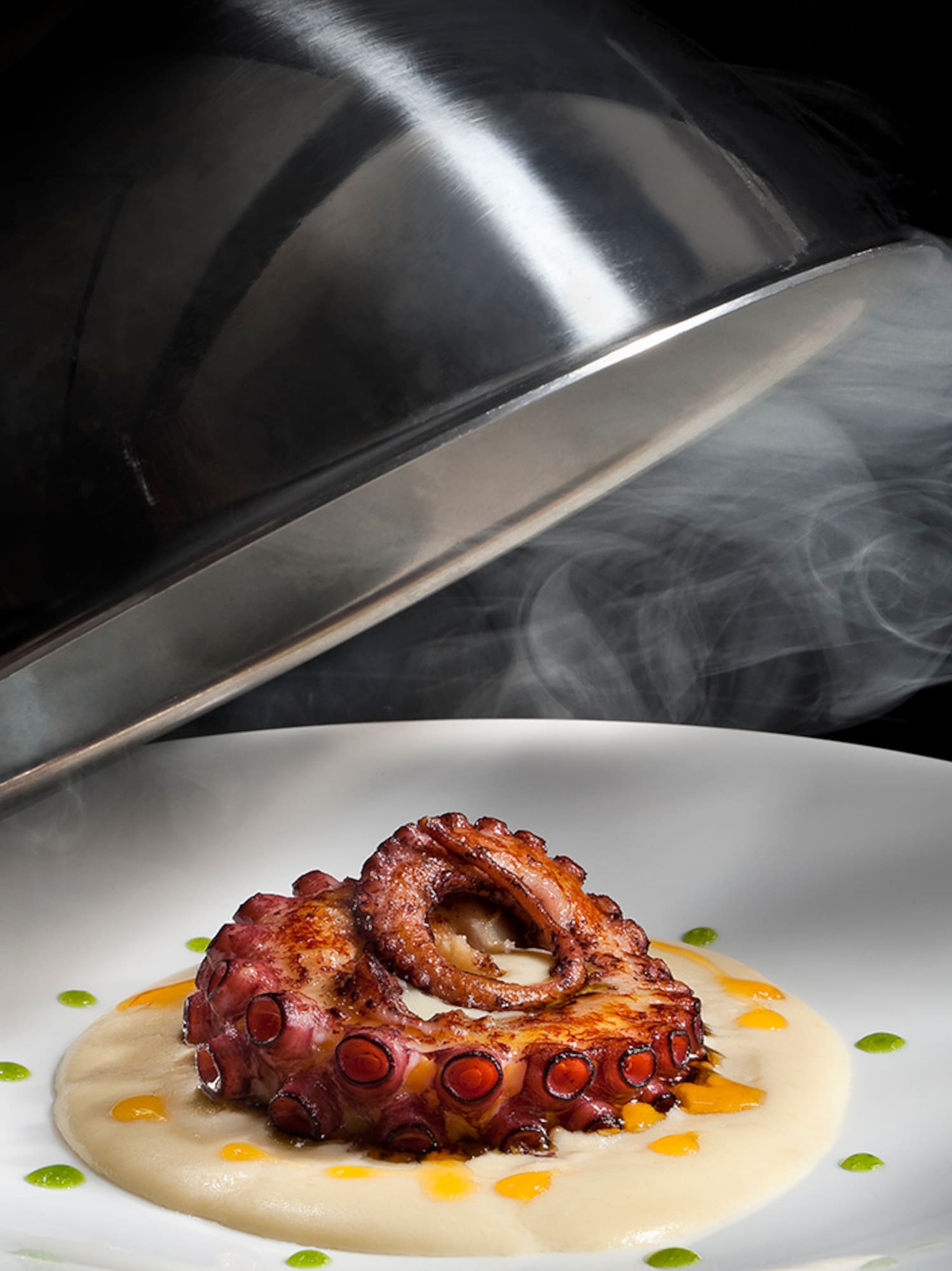 a plate of food with steam coming out of it