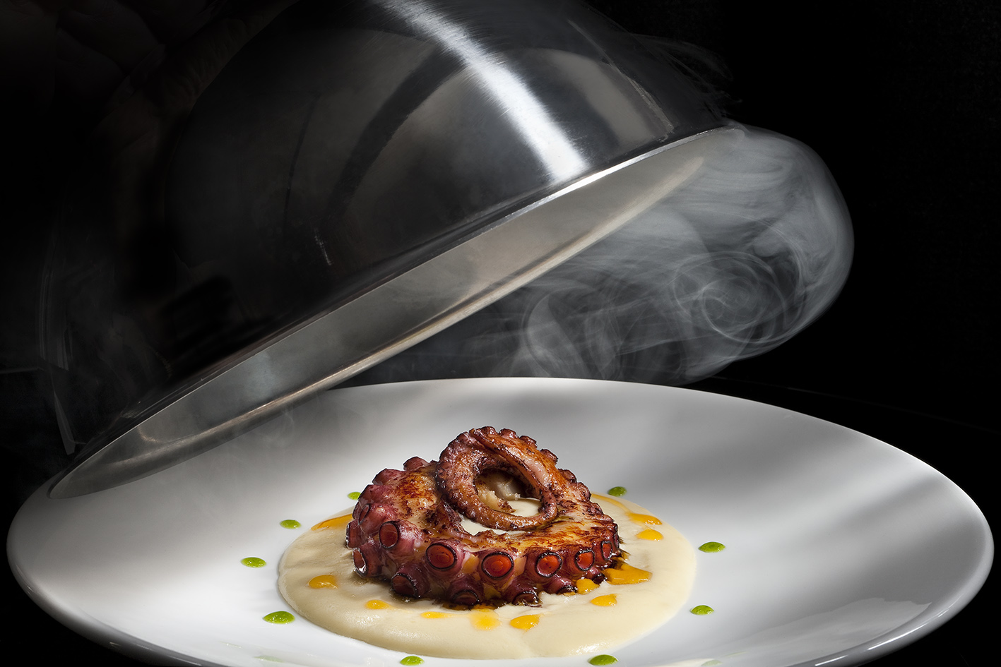 a plate of food with steam coming out of it