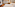 a room with two beds and a television