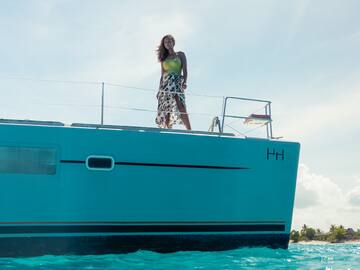 a woman standing on a boat