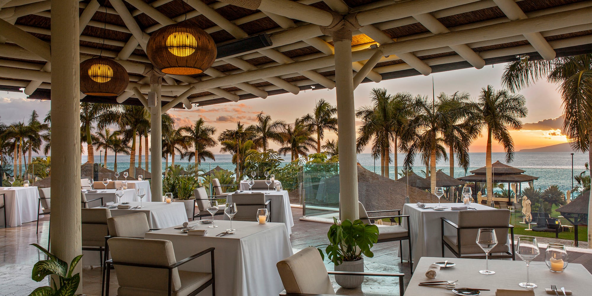 a restaurant with tables and chairs