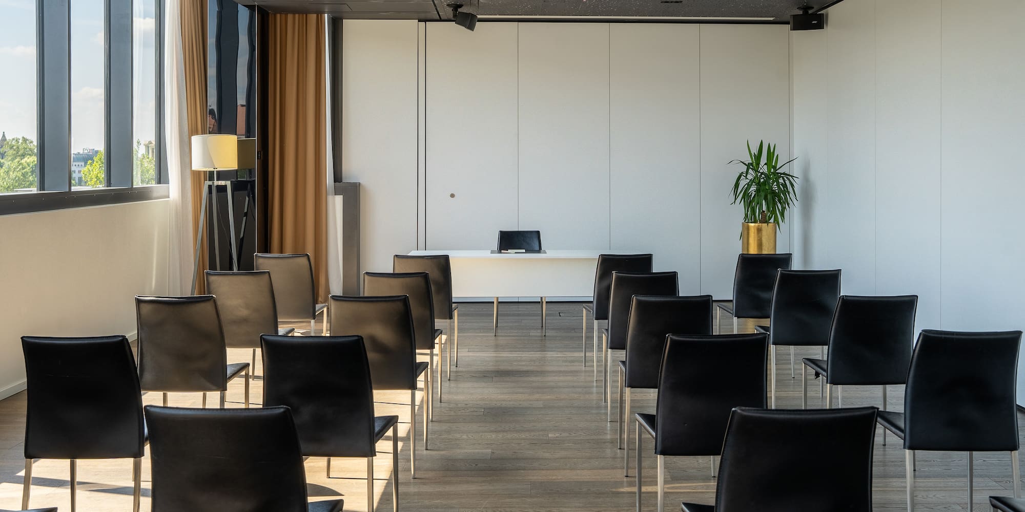 a room with chairs and a table