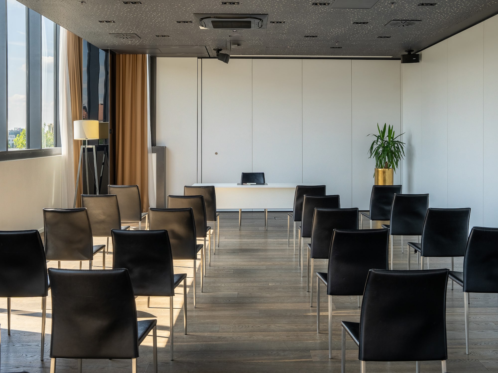 a room with chairs and a table