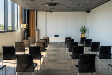 a room with chairs and a table