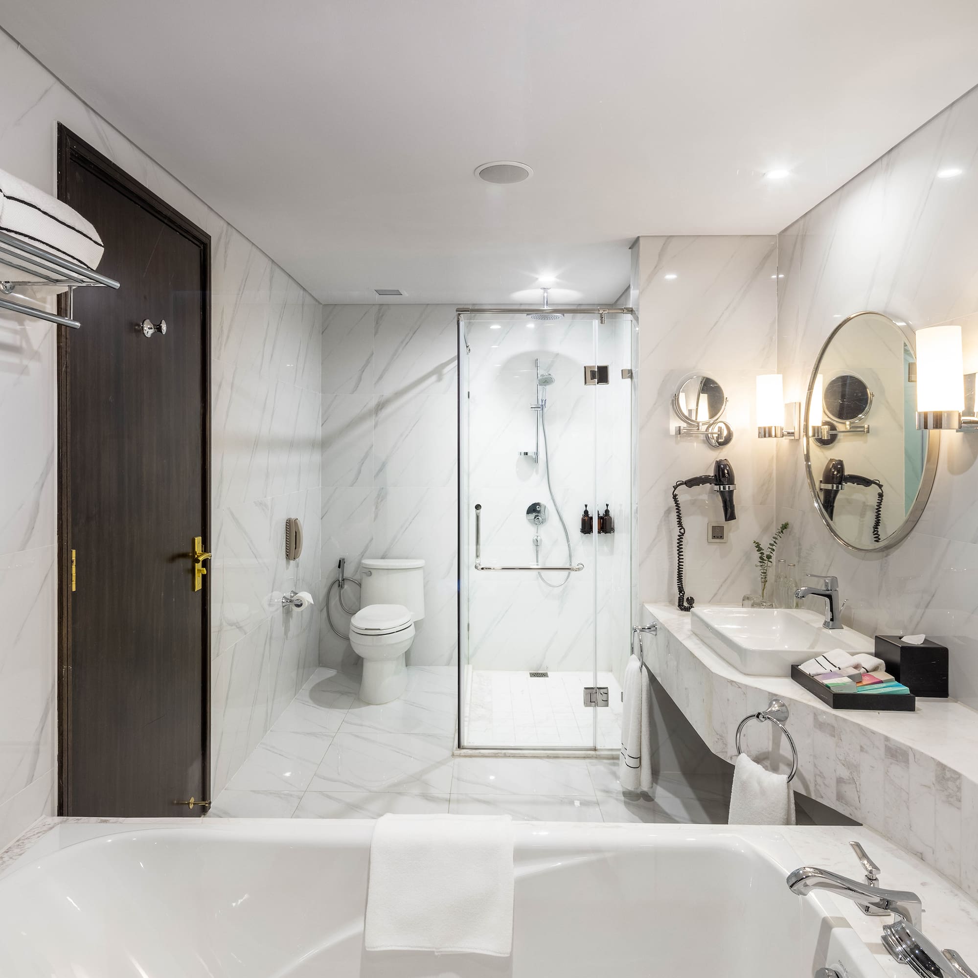 a bathroom with a tub and sink