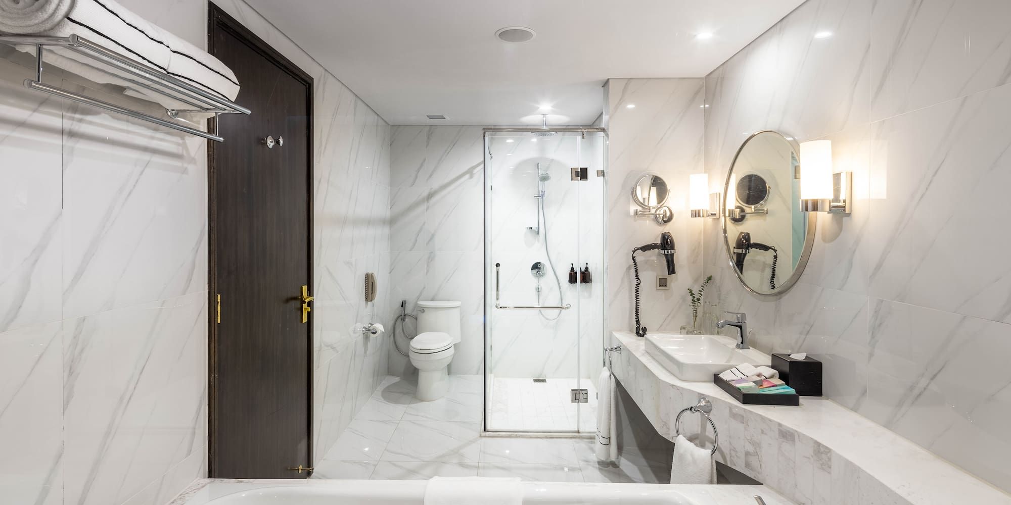 a bathroom with a tub and sink