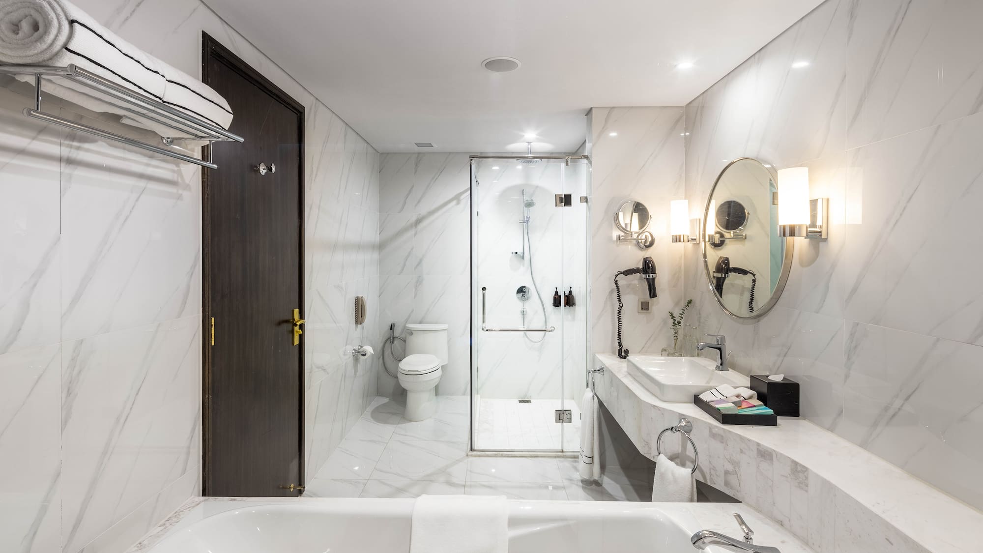 a bathroom with a tub and sink
