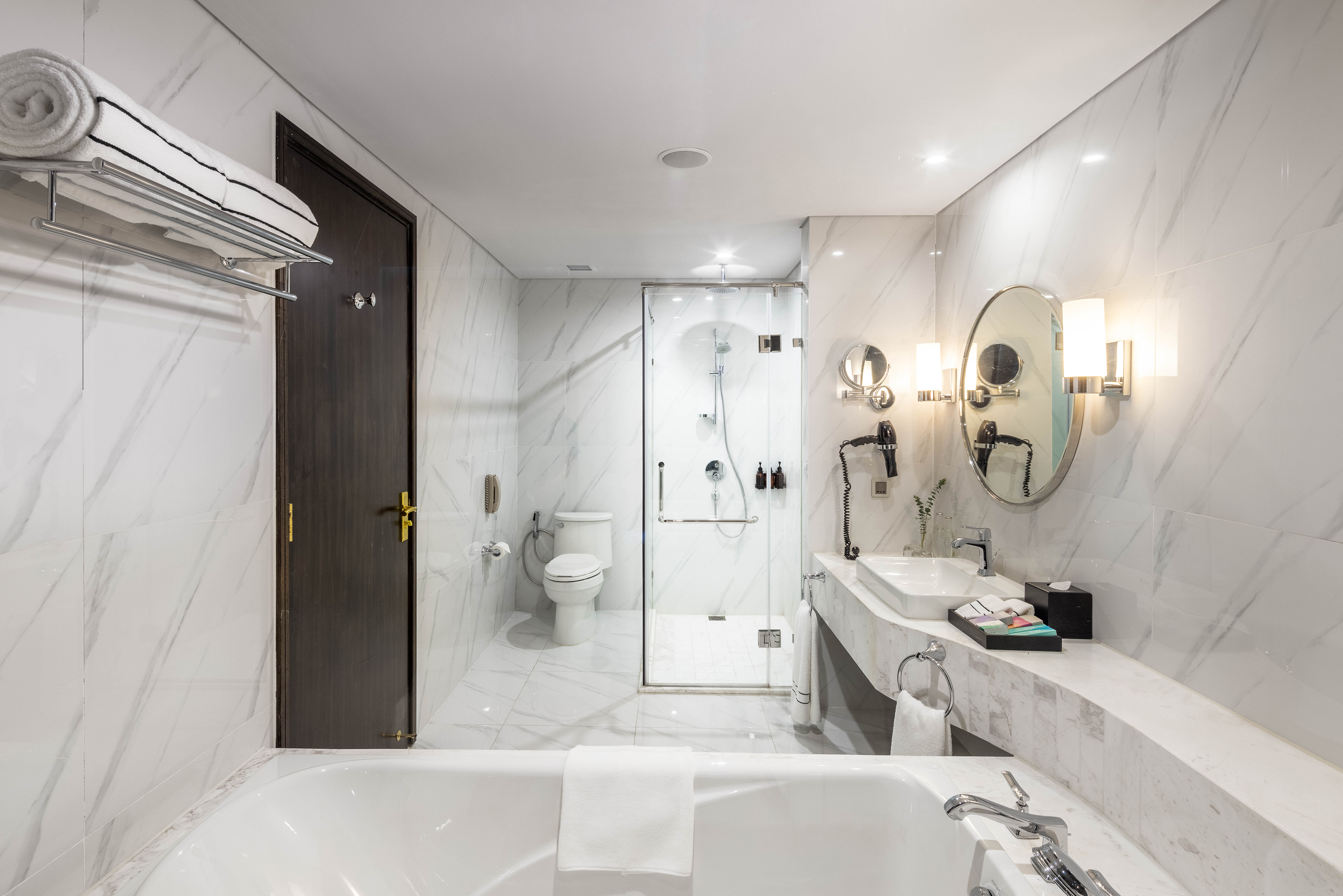 a bathroom with a tub and sink