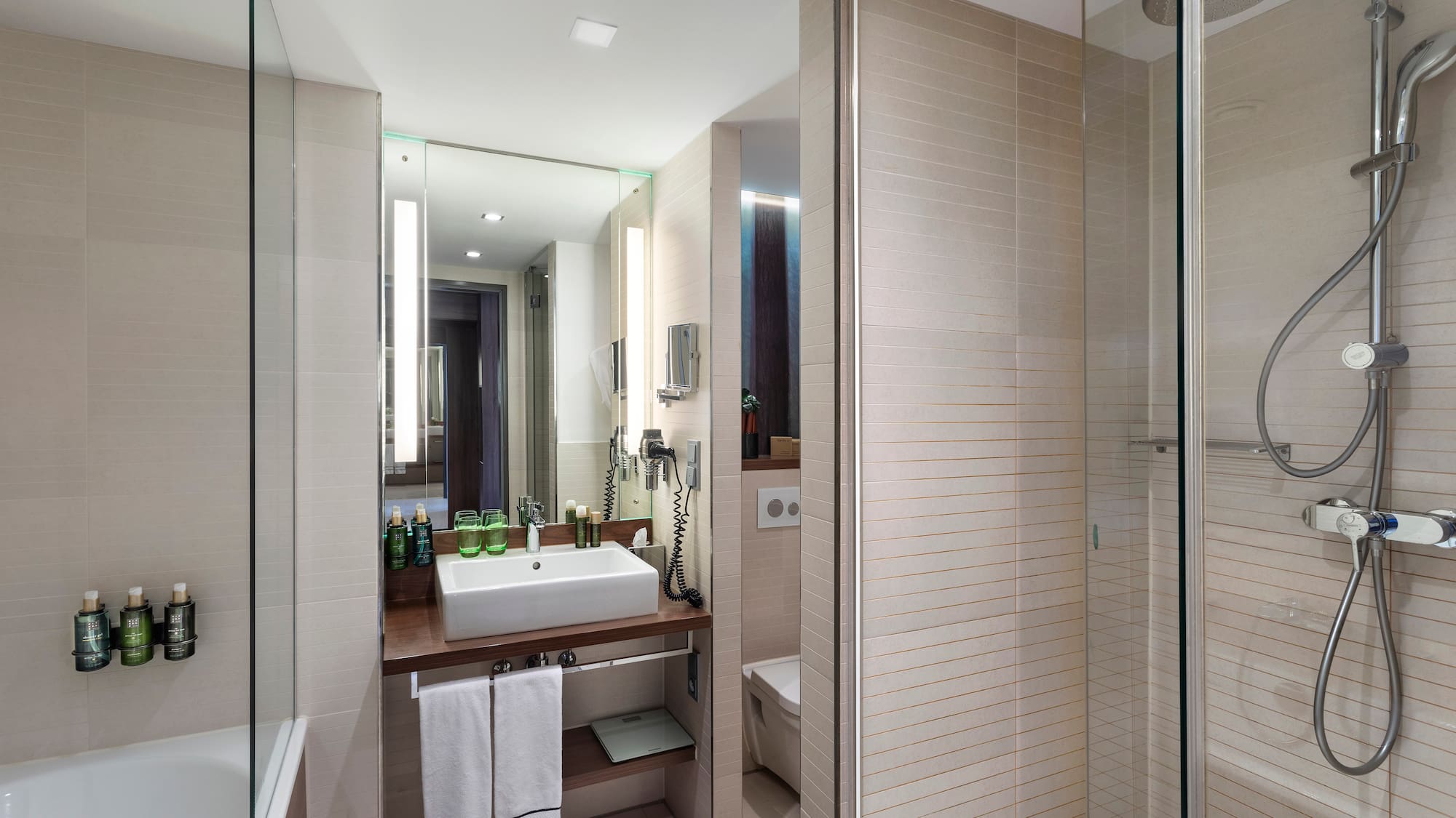 a bathroom with a sink and shower