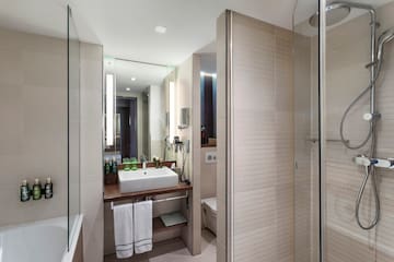 a bathroom with a sink and shower