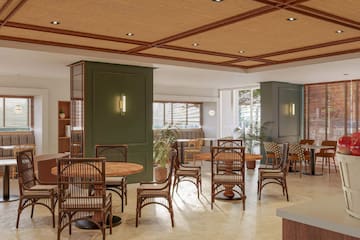 a room with a table and chairs