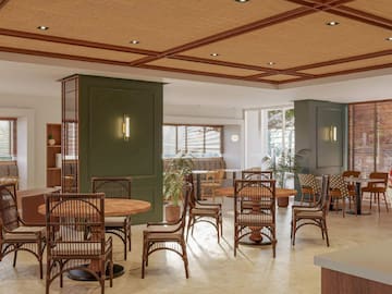 a room with a table and chairs