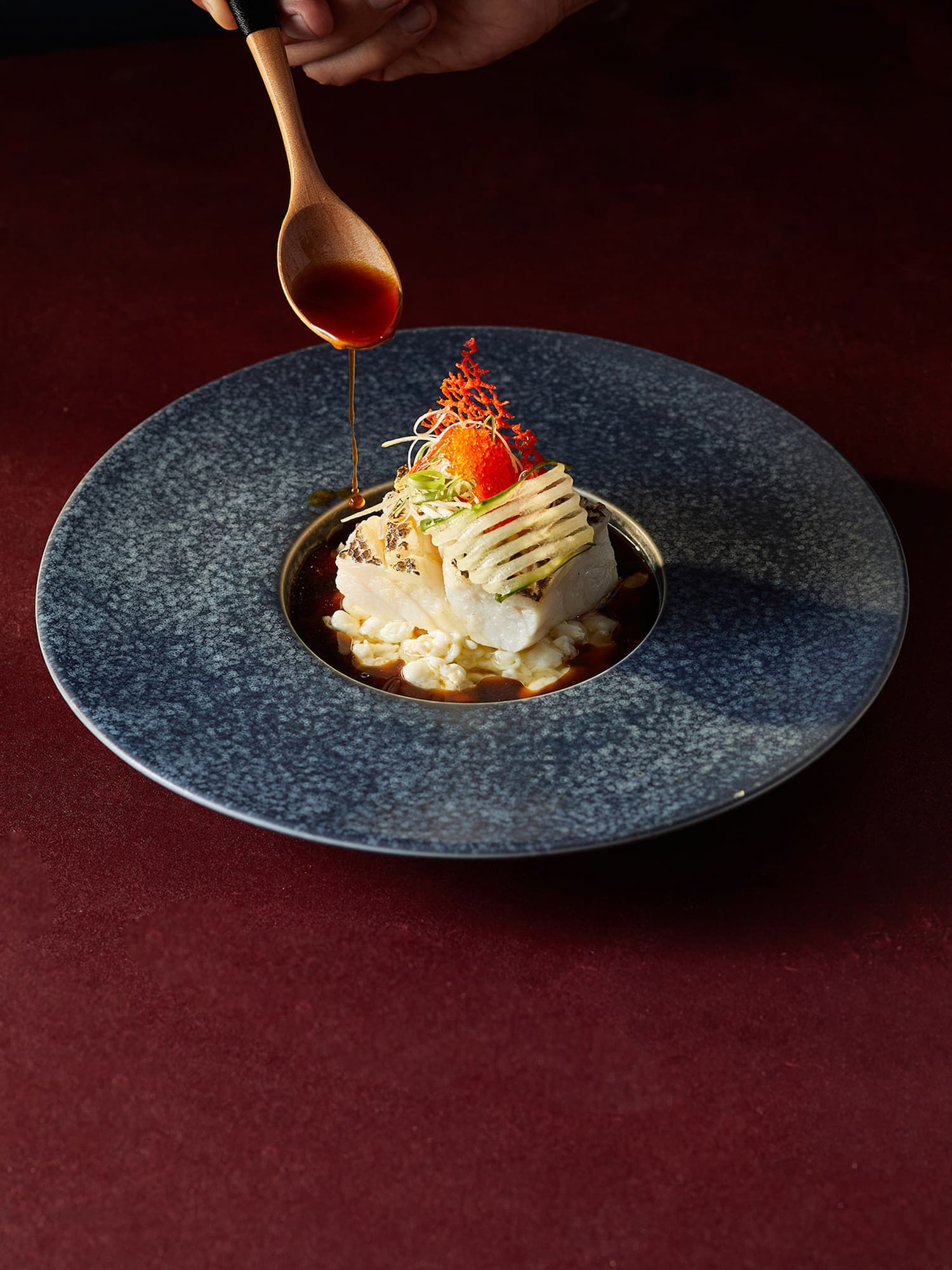 a plate of food with a spoon