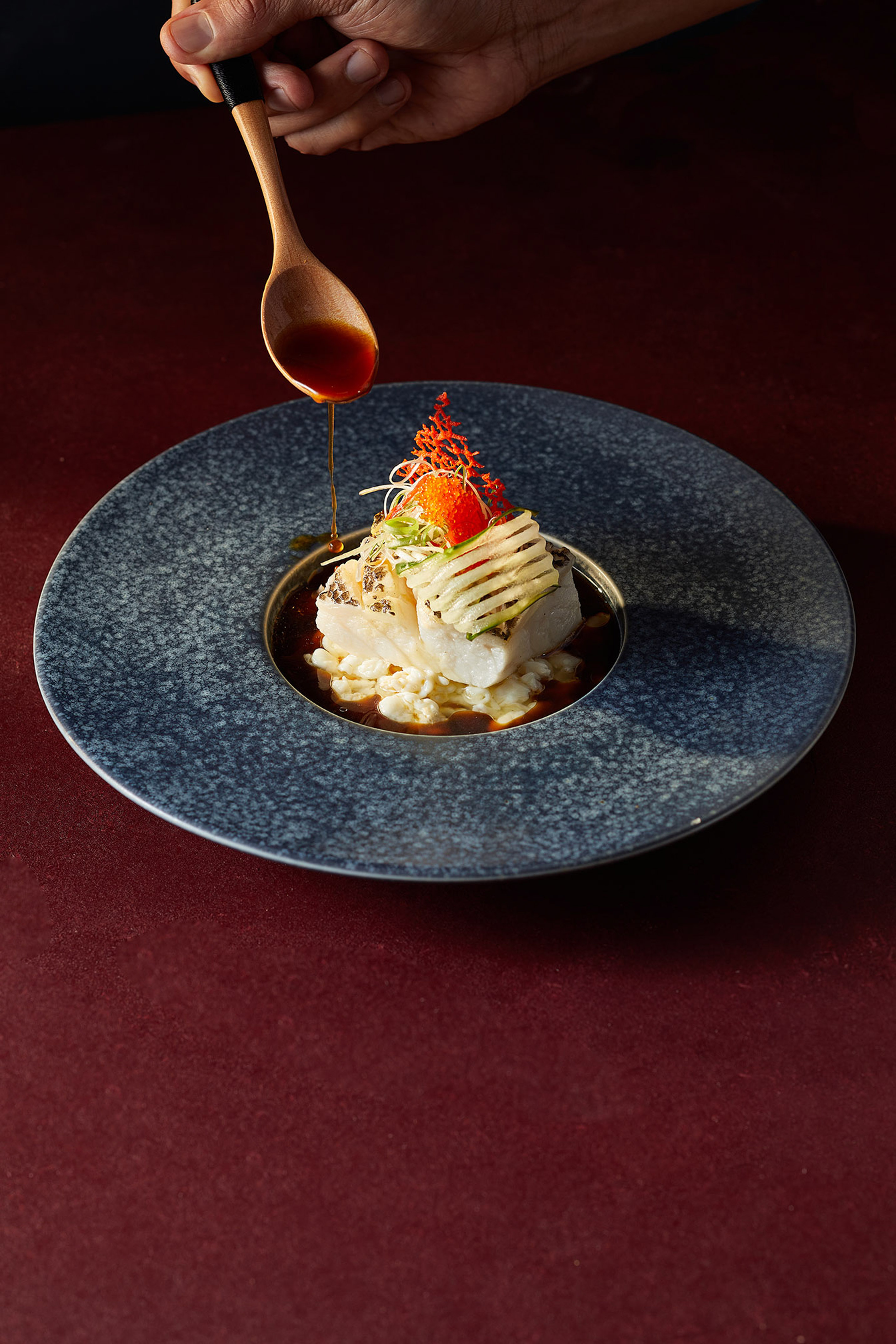 a plate of food with a spoon