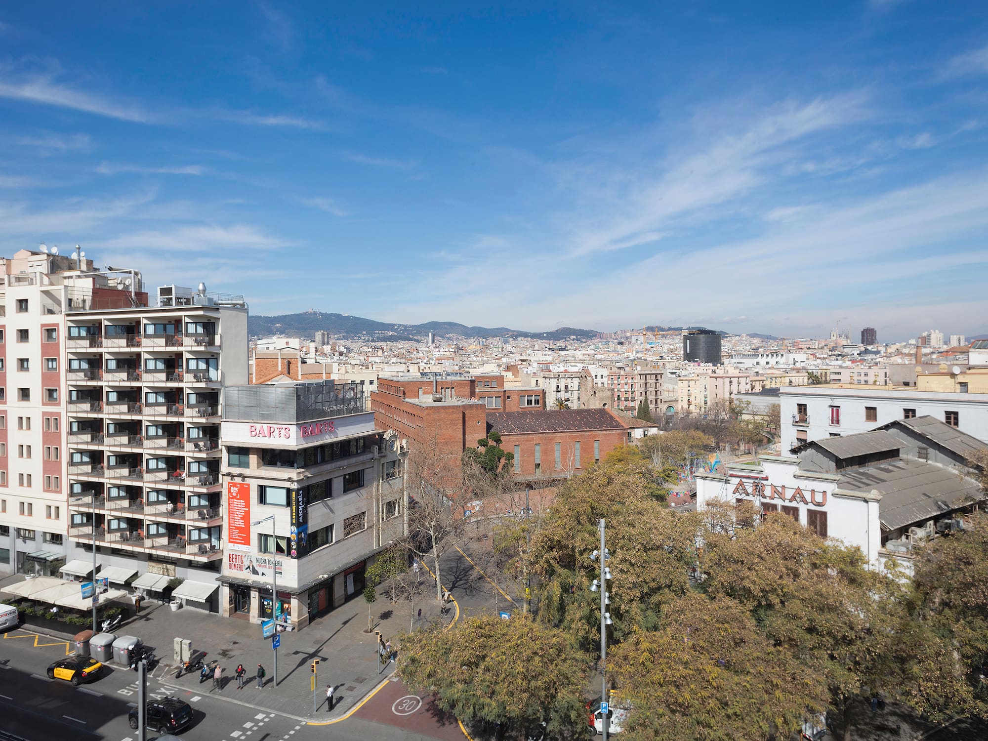 a city with many buildings and trees