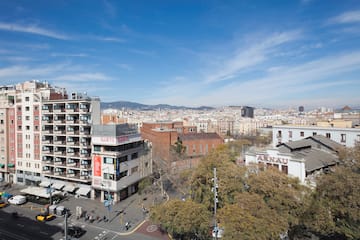 a city with many buildings and trees