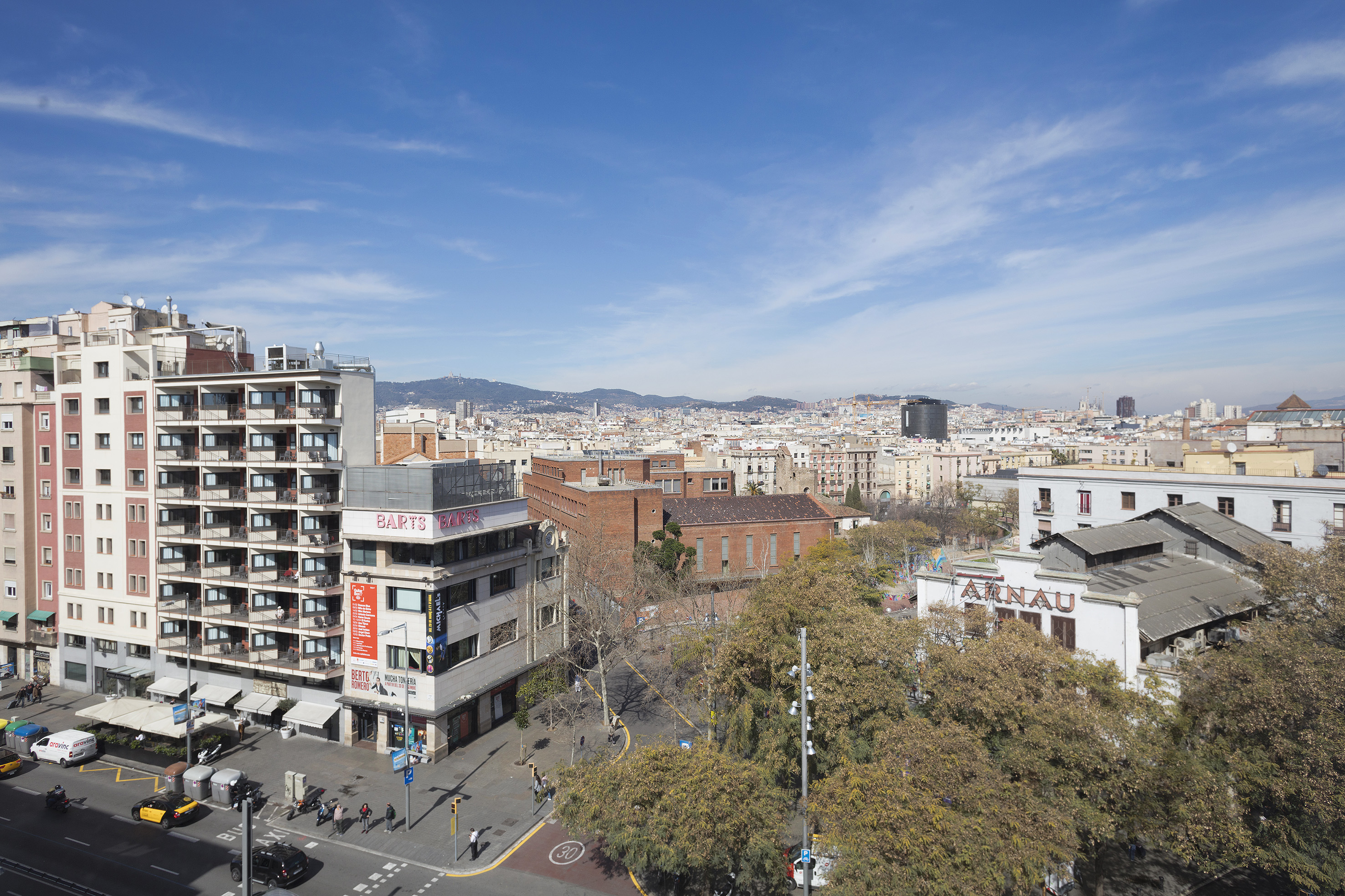 a city with many buildings and trees